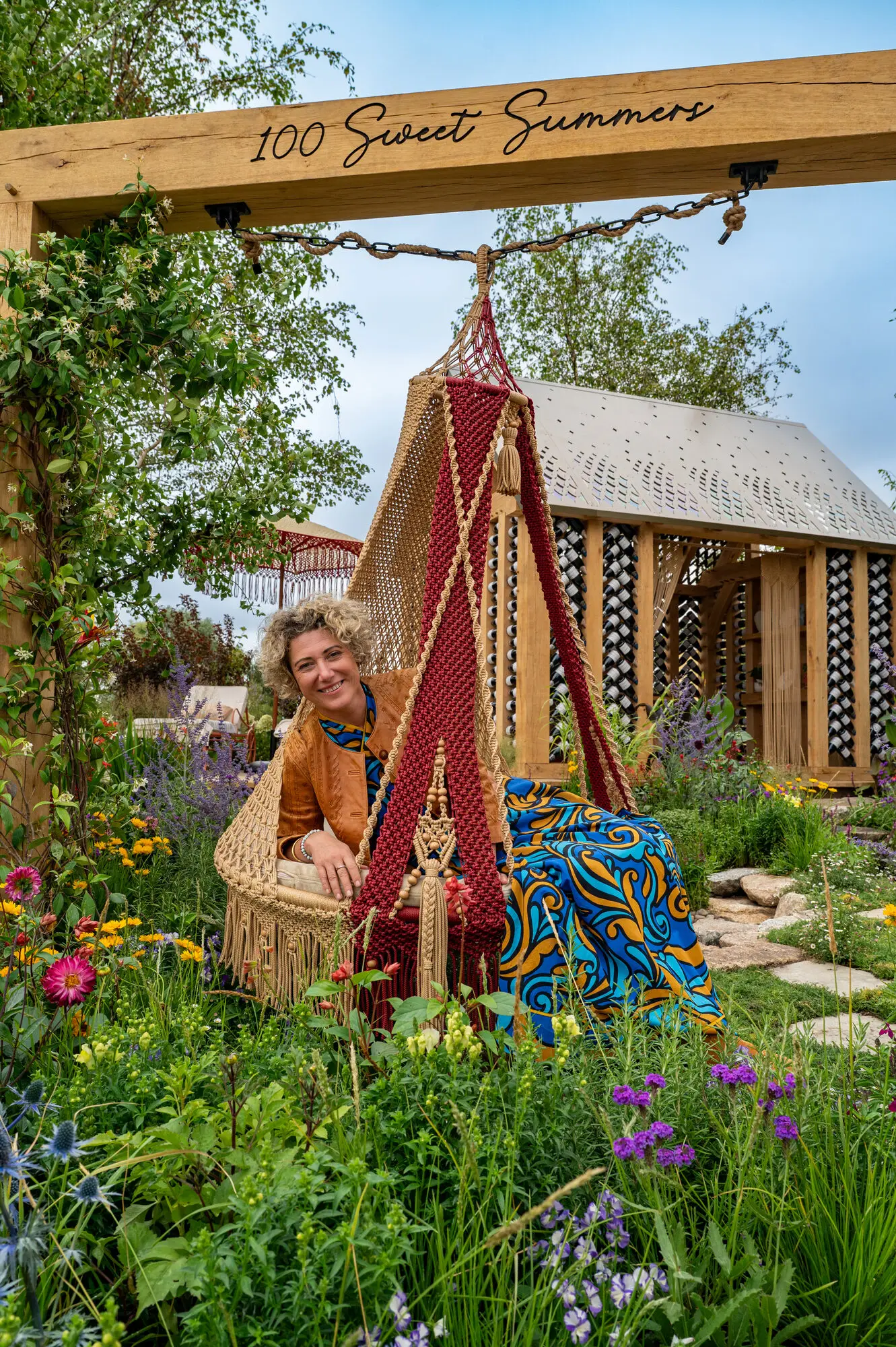 Kitti Kovacs in her award-winning 100 Sweet Summers show garden at RHS Sandringham 2026